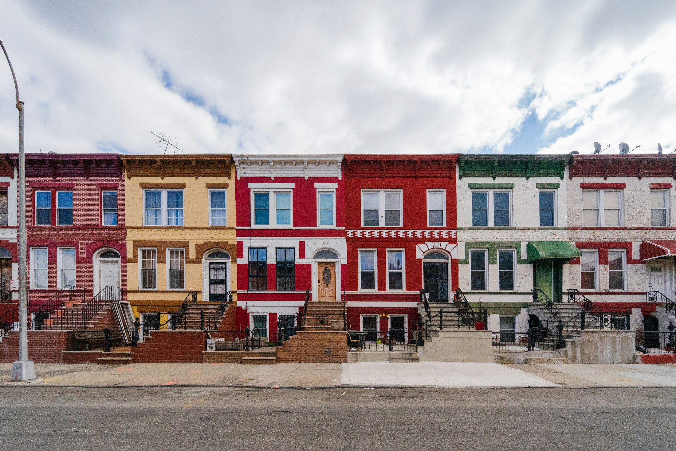A vibrant row of residential buildings in Crown Heights, Brooklyn